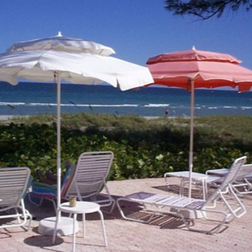 Sombrillas redondas Sanibel de dos niveles o ventilas ideales para la playa